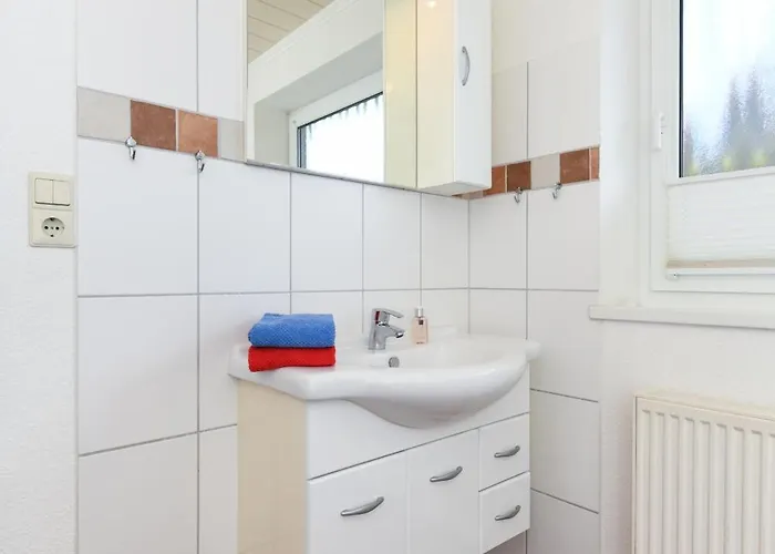 Апартаменты Friesengold Im Haus Kluntje Нойхарлингерзиль